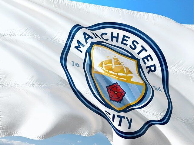 Manchester city logo on a flag